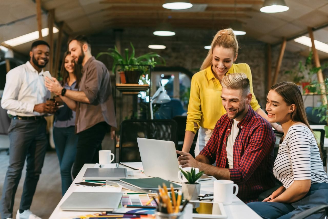 young web designers working together at modern office.jpg